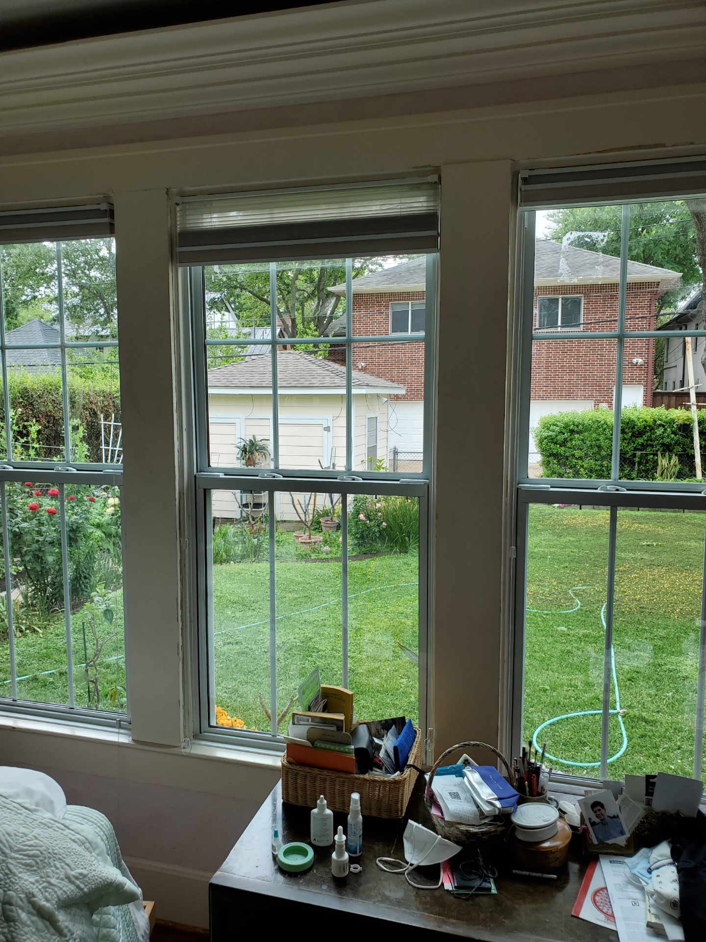 Triple panel aluminum window with divided light style